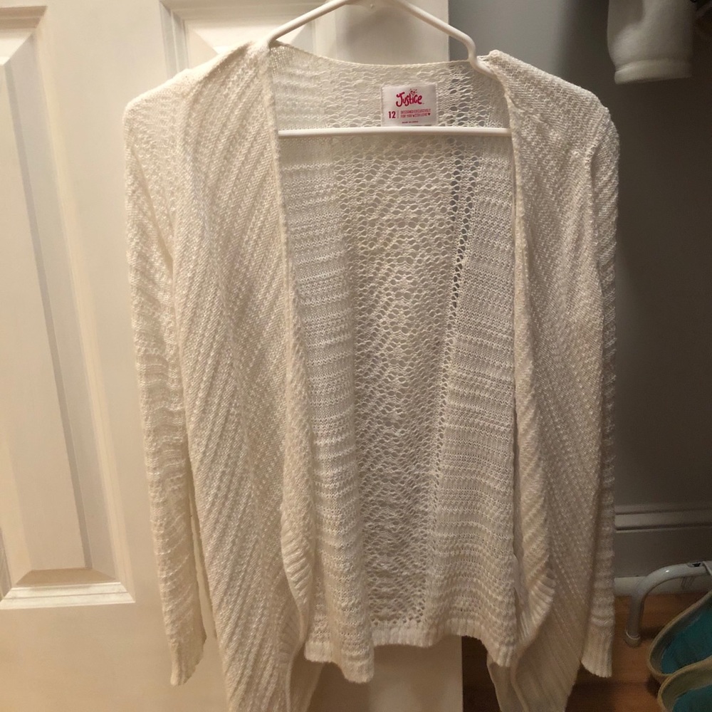 White cardigan.